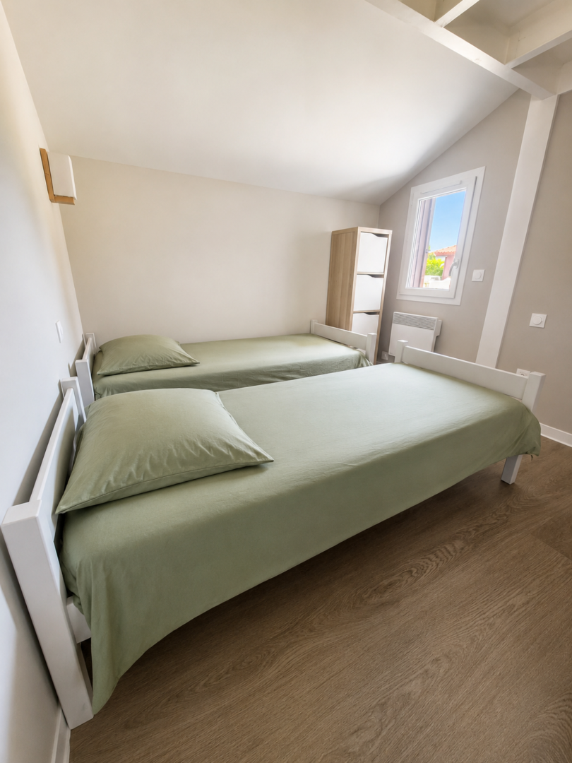 Chambre lits simples.png